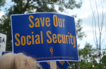 Mielenosoituskyltti, jossa lukee save our social security.